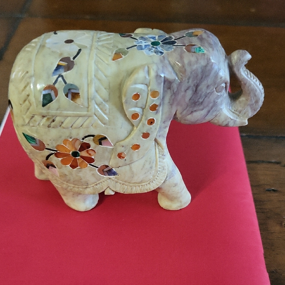 Cream and Brown Elephant Sculpture Art with Intricate Detailing